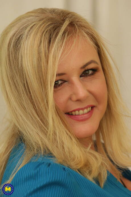 Mature NL picture collection featuring adolescent damsel in scene with inserting a toy in twat